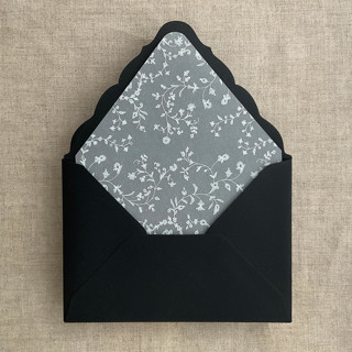 This is a white wedding envelopes by Ivory Invitations called dainty floral vines white ink printed vellum envelope liner for a7 euro flap envelope  | pack of 10 in standard