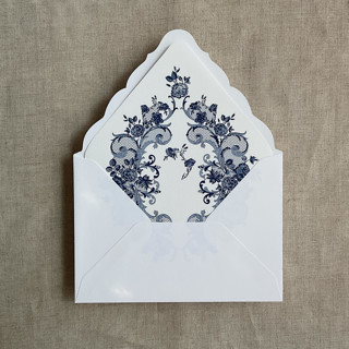 This is a blue wedding envelopes by Ivory Invitations called french rose lace navy envelope liner for a7 euro flap envelope | pack of 10 in standard