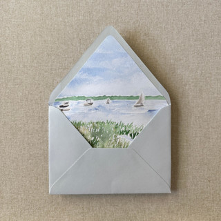 This is a multicolorassorted-colors wedding envelopes by Cotton and Bow called new england boats in harbor watercolor euroflap envelope liner | set of 10 | for 5x7” invitations in standard