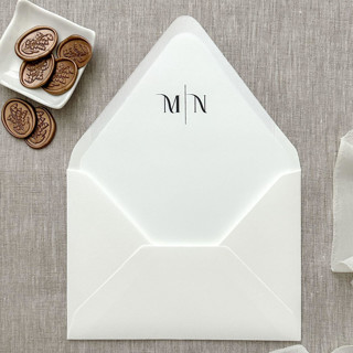 This is a black wedding envelopes by Maria Ferrer G. called customizable initials euro flap envelope liner for a7 (5x7”) invitations | set of 10 in standard