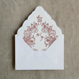 This is a pink wedding envelopes by Ivory Invitations called french rose lace old rose envelope liner for a7 euro flap envelope | pack of 10 in standard