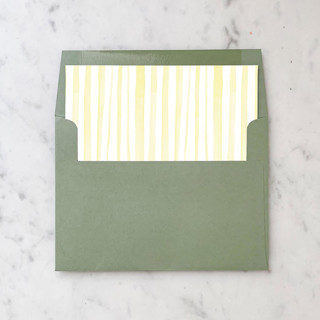 This is a yellow wedding envelopes by Design by Laney called a7 envelope liners yellow watercolor stripes square flap (set of 10) in standard