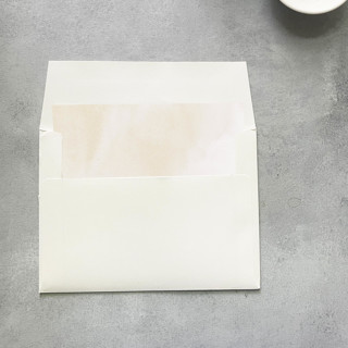 This is a natural wedding envelopes by Cotton and Bow called neutral watercolor square envelope liner | set of 10 | for 5x7” invitations  in standard