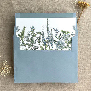 This is a blue wedding envelopes by Ivory Invitations called bluebell flower botanical printed envelope liner for a7 square flap envelope  | pack of 10 in standard