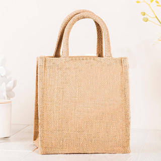 This is a natural wedding day of favors by Veronica Esquino called medium jute bags 10 pack in standard