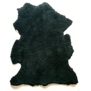 This is a black rugs by Millstream Home called the sheepskin rug in black in standard