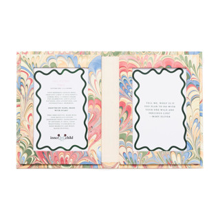 This is a multicolorassorted-colors accent pieces by Inner Child called hand marbled picture frame folding book, 4x6 in multicolor marbling in standard