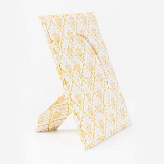This is a beige accent pieces by Inner Child called blockprint tulip picture frame in desert sand, 4x6 in standard
