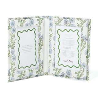 This is a blue accent pieces by Inner Child called blockprint picture frame folding book, 4x6 in forget-me-not in standard