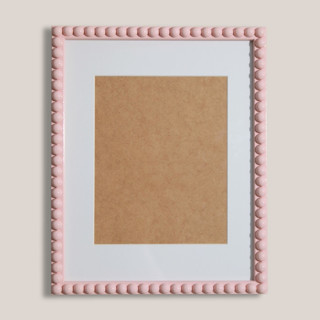 This is a pink accent pieces by Lily Field Studio called pink beaded frame with white mat in standard