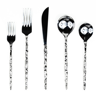 This is a silver tableware by Shelton Metal called sand drip flatware set- stainless steel in standard