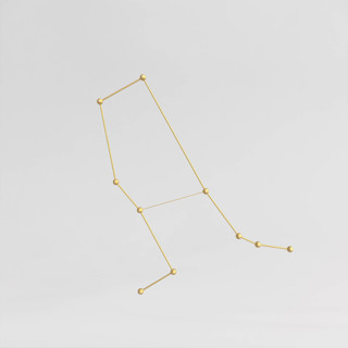 This is a brass home decor by Richard Clarkson called constellation in standard