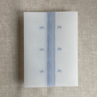 This is a blue vellum wedding invitations by Ivory Invitations called blue ribbons printed vellum wraps for 5x7 card | pack of 10 in standard
