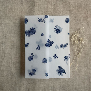 This is a blue vellum wedding invitations by Ivory Invitations called navy french roses lace floral printed vellum wrap for 5x7 card  | pack of 10 in standard
