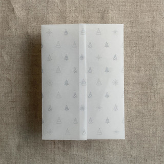 This is a blue vellum wedding invitations by Ivory Invitations called steel blue snow flake and forest vellum wrap for 5x7 card | pack of 10 in standard