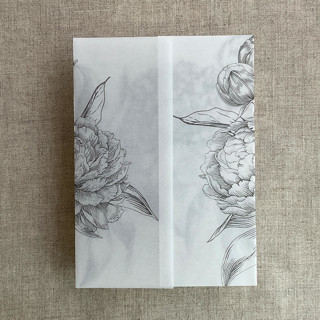 This is a gray vellum wedding invitations by Ivory Invitations called slate etched grand peony floral printed vellum wrap for 5x7 card  | pack of 10 in standard