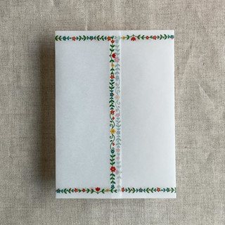 This is a multicolorassorted-colors vellum wedding invitations by Ivory Invitations called still bloom floral printed vellum wrap for 5x7 card | pack of 10 in standard