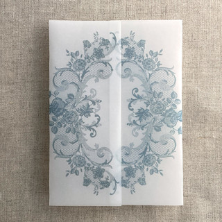 This is a blue vellum wedding invitations by Ivory Invitations called steel blue la belle antique rose floral lace printed vellum wrap for 5x7 card  | pack of 10 in standard