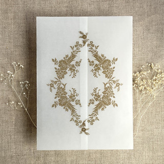 This is a beige vellum wedding invitations by Ivory Invitations called hazelnut print french floral crest vellum wrap for 5x7 card | pack of 10 in standard