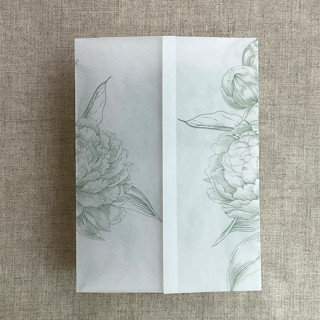 This is a green vellum wedding invitations by Ivory Invitations called sage etched grand peony floral printed vellum wrap for 5x7 card  | pack of 10 in standard