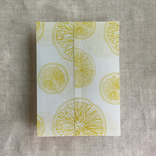 This is a yellow vellum wedding invitations by Ivory Invitations called lemon citrus celebration printed vellum wraps for 5x7 card | pack of 10 in standard