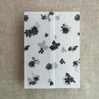 This is a black vellum wedding invitations by Ivory Invitations called black french roses lace floral printed vellum wrap for 5x7 card  | pack of 10 in standard