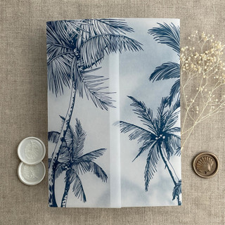 This is a blue vellum wedding invitations by Ivory Invitations called palm trees beach side navy printed vellum wrap for 5x7 card | pack of 10 in standard