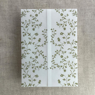 This is a green vellum wedding invitations by Ivory Invitations called moss green dainty floral vines printed vellum wrap for 5x7 card  | pack of 10 in standard