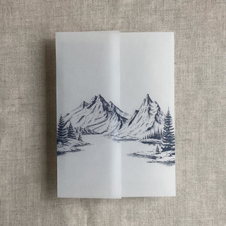 This is a blue vellum wedding invitations by Ivory Invitations called blue mountain sketch printed vellum wrap for 5x7 card | pack of 10 in standard