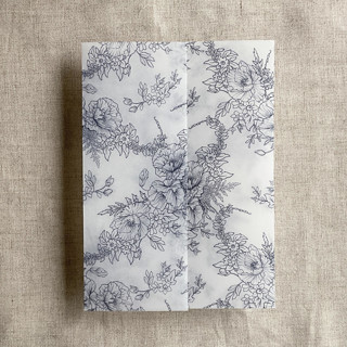 This is a blue vellum wedding invitations by Ivory Invitations called deep blue poppy floral toile printed vellum wrap for 5x7 card | pack of 10 in standard