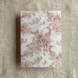 This is a copper vellum wedding invitations by Ivory Invitations called rust poppy floral toile printed vellum wrap for 5x7 card | pack of 10 in standard
