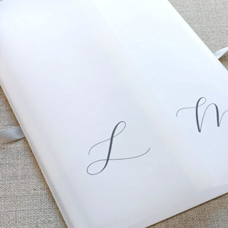 This is a black vellum wedding invitations by Caroline Russo called personalized vellum jacket with initials (set of 10) in standard