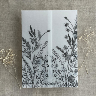 This is a black vellum wedding invitations by Ivory Invitations called black english botanical garden floral printed vellum wrap for 5x7 card | pack of 10 in standard