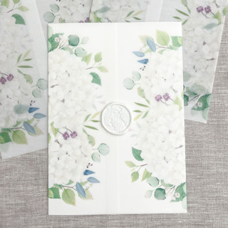 This is a multicolorassorted-colors vellum wedding invitations by Maria Ferrer G. called white hydrangeas vellum warps for 5x7 invitations | set of 10 in standard