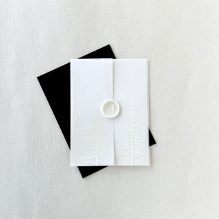 This is a white vellum wedding invitations by Eva Friesen called white ink printed pine tree vellum jacket wrap | set of 10 in standard