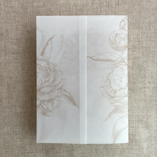 This is a beige vellum wedding invitations by Ivory Invitations called cashmere etched grand peony floral printed vellum wrap for 5x7 card  | pack of 10 in standard