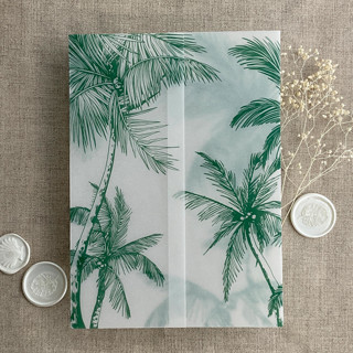 This is a green vellum wedding invitations by Ivory Invitations called palm trees beach side emerald printed vellum wrap for 5x7 card | pack of 10 in standard