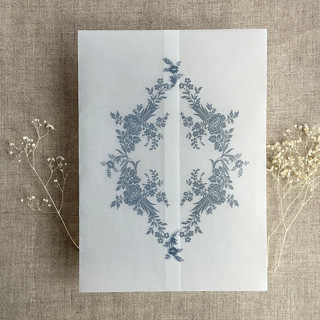 This is a blue vellum wedding invitations by Ivory Invitations called french blue print french floral crest vellum wrap for 5x7 card | pack of 10 in standard