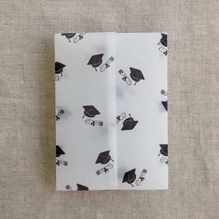 This is a black vellum wedding invitations by Ivory Invitations called congrats graduation printed vellum wrap for 5x7 card | pack of 10 in standard