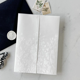 This is a white vellum wedding invitations by Eva Friesen called vintage floral white vellum wrap | set of 10 in standard
