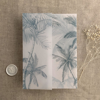 This is a blue vellum wedding invitations by Ivory Invitations called palm trees beach side steel blue printed vellum wrap for 5x7 card | pack of 10 in standard