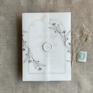 This is a black vellum wedding invitations by Ivory Invitations called jessica black minimalist flowers printed vellum wrap for 5x7 card | pack of 10 in standard