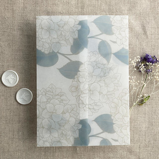 This is a blue vellum wedding invitations by Ivory Invitations called antique hydrangea flower steel blue leaf printed vellum wrap for 5x7 card | pack of 10 in standard