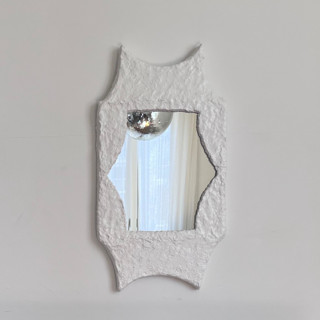 This is a white accent pieces by Kristin Yezza called palacete iii in standard