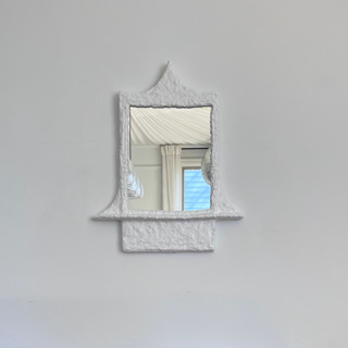 This is a white accent pieces by Kristin Yezza called palacete i in standard