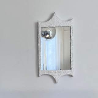 This is a white accent pieces by Kristin Yezza called palacete ii in standard