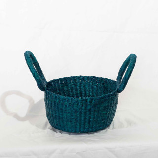 This is a green accent pieces by AKETEKETE called taabi basket small (peacock) in standard