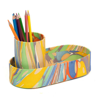 This is a yellow accent pieces by Inner Child called hand-marbled desk tray & pencil holder organizer in rainbow marbling in standard