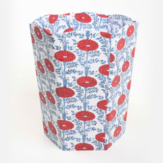This is a red accent pieces by Inner Child called blockprint scallop waste bin / storage bin in araminta in standard