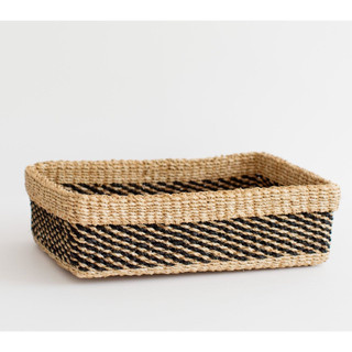 This is a black accent pieces by Jennifer Abelev called woven catchall storage tray | stripe noir in standard